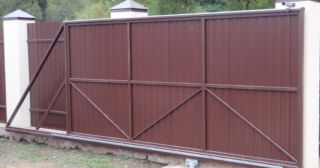 Купить откатные ворота из профнастила Анжеро-Судженск, цена от 1773 руб.