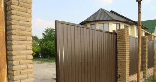 Купить откатные ворота из профнастила Анжеро-Судженск, цена от 1773 руб.